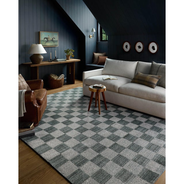 The Calvin Collection by Chris Loves Julia x Loloi is a geometric area rug with tile-inspired patterns for contemporary...