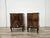 An elegant pair of Chippendale-style nightstands dating back to the 1940s, featuring refined craftsmanship and a rich...