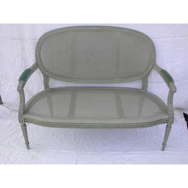 Vienna straw lounge set, lacquered, comprising a sofa and two chairs, Vienna, Austria. The frame is in good condition. The...