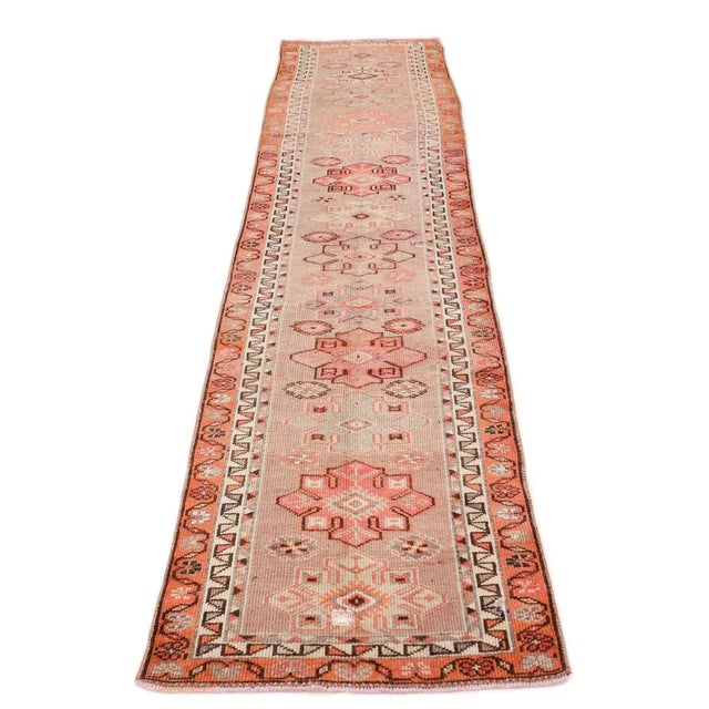 Handknotted vintage decorative Herki runner from Northern Iraq. Approximately 50-60 years old. In very good condition.