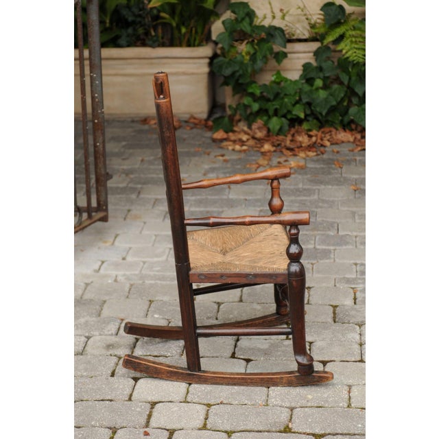 Early 19th Century English 1800s Georgian Period Plum Wood Child's Rocking Chair with Rush Seat For Sale - Image 5 of 11