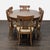 Classic Thomasville dining set featuring an oval extension table with three removable leaves and six coordinating cane-...