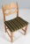 Set of striking dining chairs by Henning Kjærnulf, made of oak and original Dragør fabric as they were made originally...