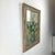 This classic floral oil painting depicts a full bouquet of blossoms gathered in a glass vase, rendered with expressive...