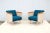 Add a touch of sophistication to your home or office with this fabulous pair of Heya lounge chairs. Designed by Roger Webb...