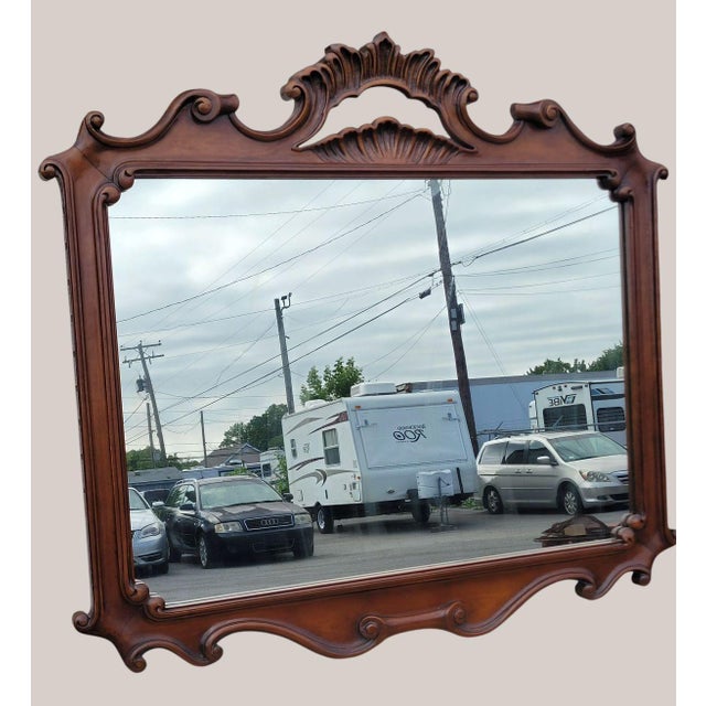 20th Century Italian Beechwood Carved Wall Mirror Stunning 20th-century Italian wall mirror crafted from solid beechwood...