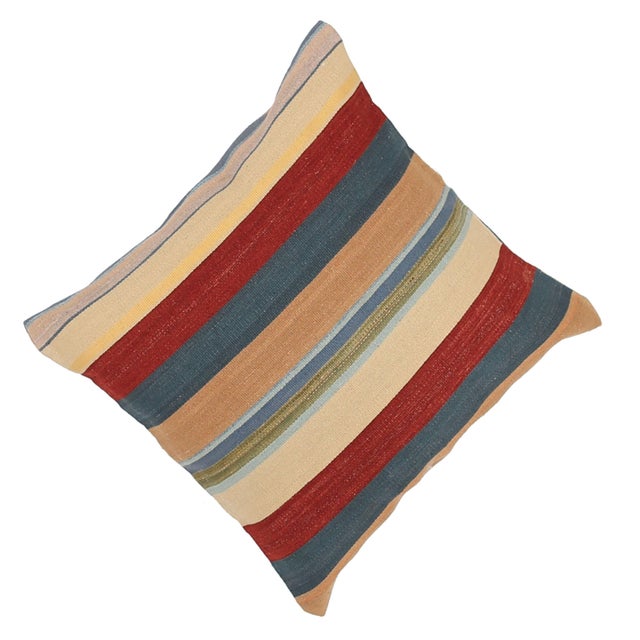 A one-of-a-kind handwoven wool kilim floor pillow featuring a rich multicolor stripe of red, slate-blue and yellow. Fully...