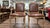 This pair of vintage French Provincial style armchairs features elegantly carved wooden frames, cabriole legs, nailhead...
