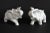 Pair of white ceramic decorative elephant figurines. No makers mark. No chips.