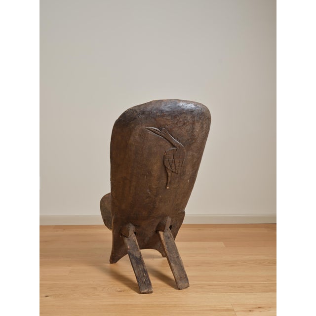 One of a kind vintage wood chair. Comes apart in two pieces. Bird carving detail on the back of the chair. Est 1900's