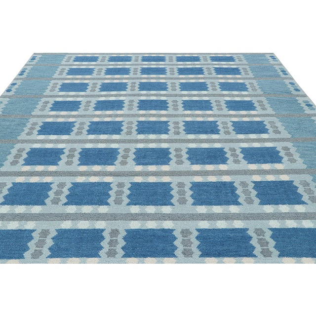 Made with hand-knotted wool, this 9x12 contemporary rug is an exciting new addition to Rug & Kilim’s Scandinavian rug...