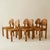 Set of 6 pine dining chairs by Danish Designer Rainer Daumiller from the 1960's-1970's. These sculptural chairs are as...