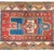 A striking early 20th-century Kazak prayer rug, this piece showcases the bold geometric artistry and rich color palette...
