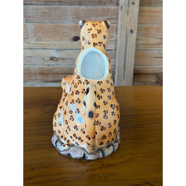A charming vintage ceramic figural pitcher featuring a seated leopard accompanied by her adorable cub. Beautifully...