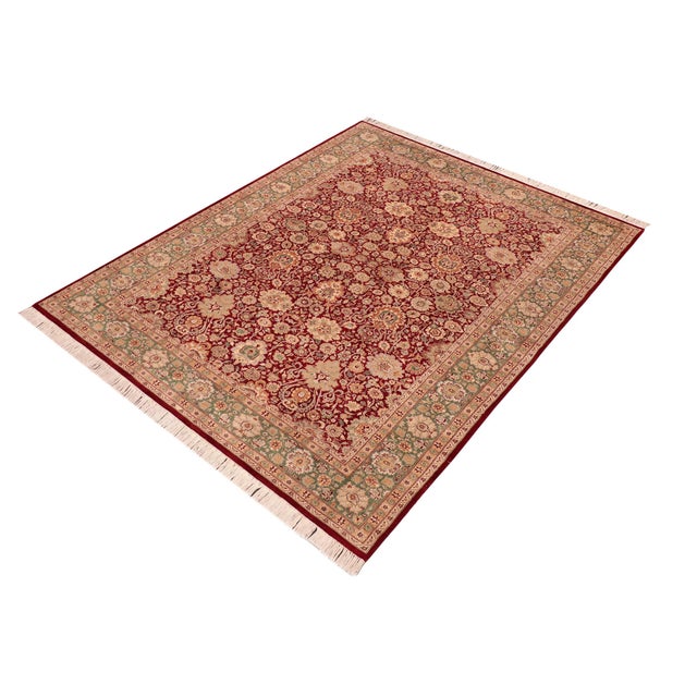 This hand‑knotted Pak Persian round rug showcases the finest expression of traditional Persian artistry. Each piece is...