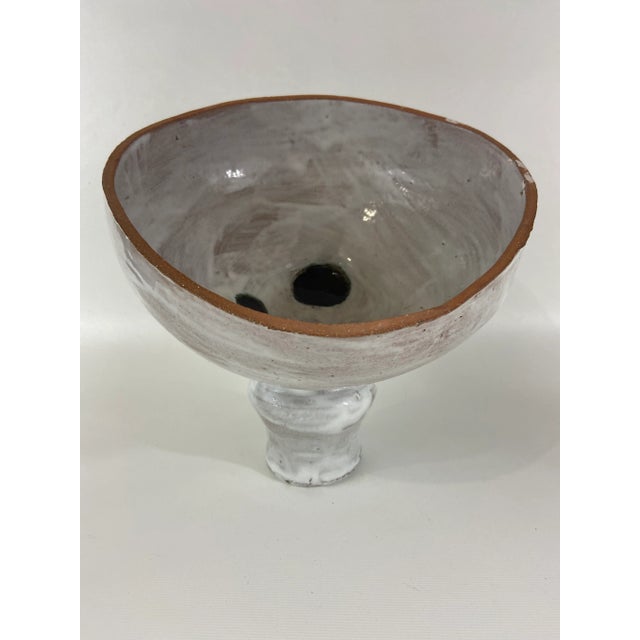 Modern art pottery footed bowl or sculpture with rustic white glazed finish and black abstract decoration. Could be used...