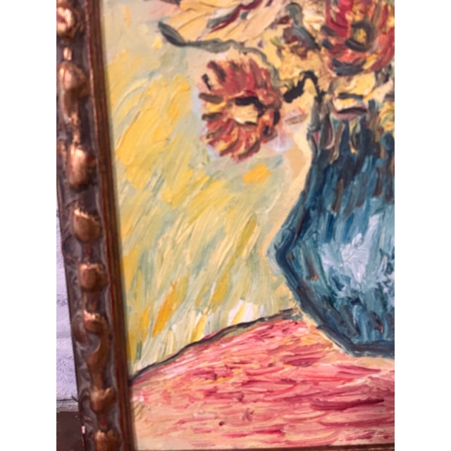 This expressive vintage oil painting features a colorful bouquet of flowers arranged in a distinctive blue-green pitcher,...