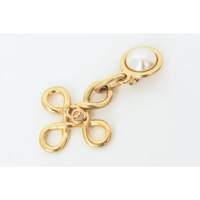This is part of Chairish’s Costume Jewelry assortment. This fabulous pair of vintage authentic hallmarked Channel long...