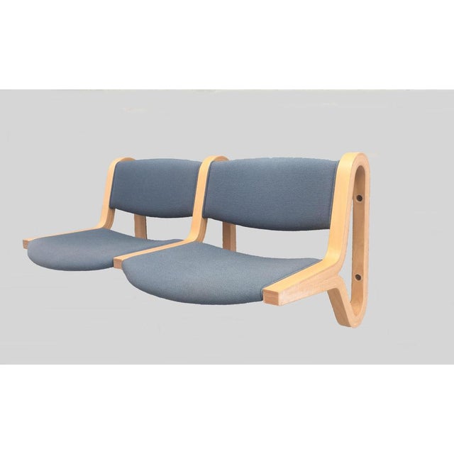 1980s Rud Thygesen and Johnny Sørensen wall mounted two seat bench in beech by Magnus Olesen. The benches were made as...