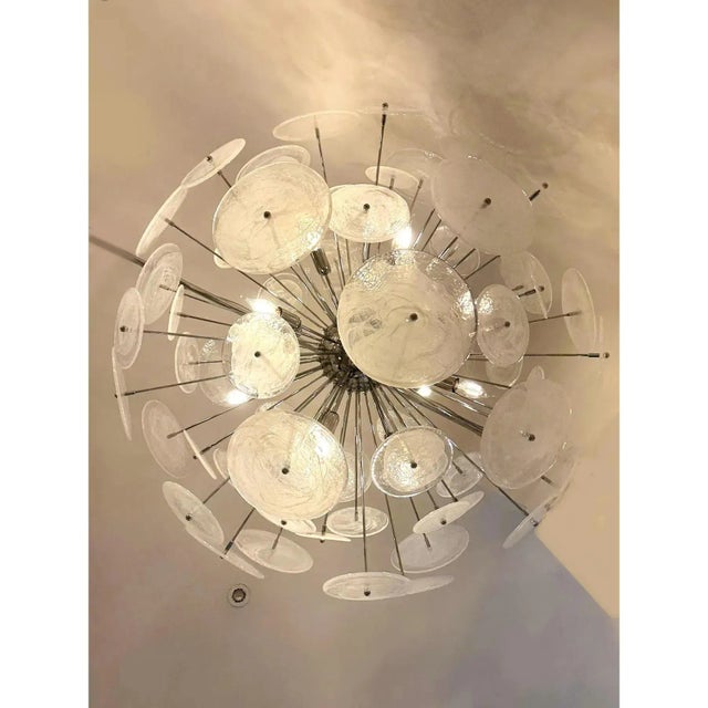 Luxury bright sputnik chandelier in cromed metal frame. contemporary disks murano glass worked in venied-white "alabastro"...
