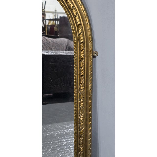 A very good Victorian gilt overmantle mirror of small proportions, with original backboards and plate glass, in very good...