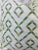 Custom pair of 22” pillows covered in a off white woven fabric with a chevron patter with diamond shaped in teal, aqua,...