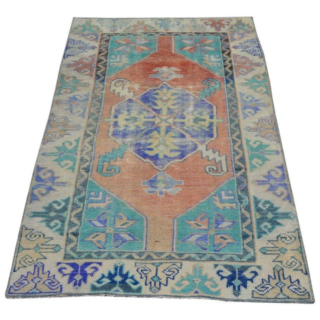 Hand-knotted with care using traditional rug-making techniques, this wool rug blends timeless craftsmanship with a modern...