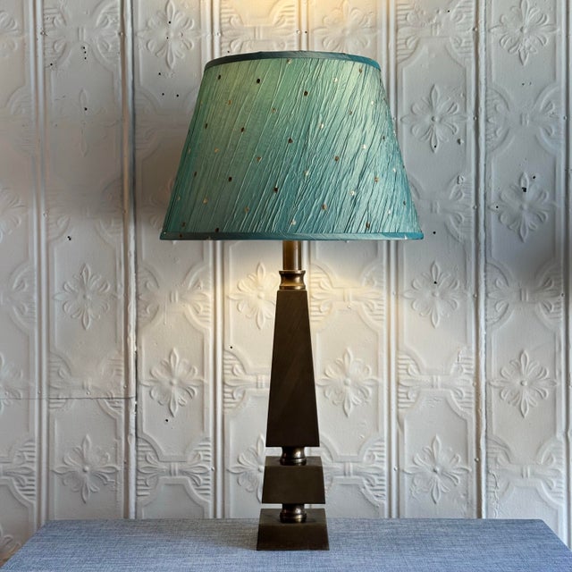 Quality architectural bronze lamp base in a stacked geometric pattern. 4” square bottom base 21.75” height to socket top...