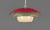 A playful and uncommon Danish pendant lamp from the 1970s, combining a red, olive and cream outer shades. Its layered...