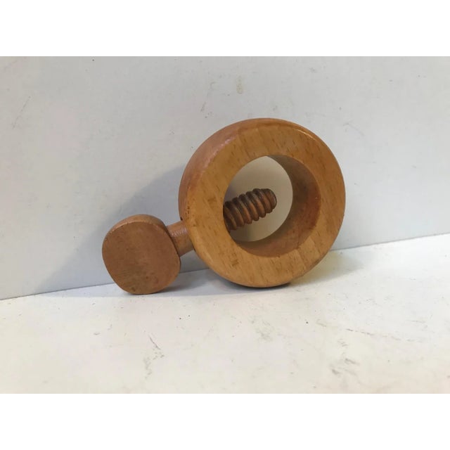 These screw nutcrackers are made of beech and were designed by Kay Bojesen in the late 1950s. These 3 were manufactured at...