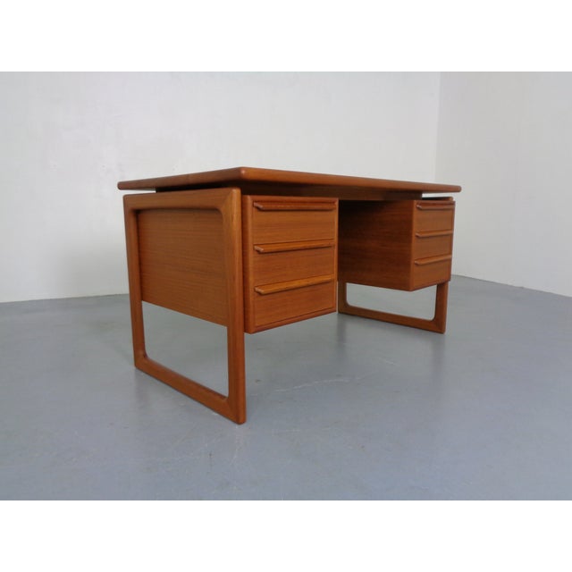 Danish desk by Gasvig Mobler from the 1960s. Three drawers on each side. A large compartment in the center. I have...