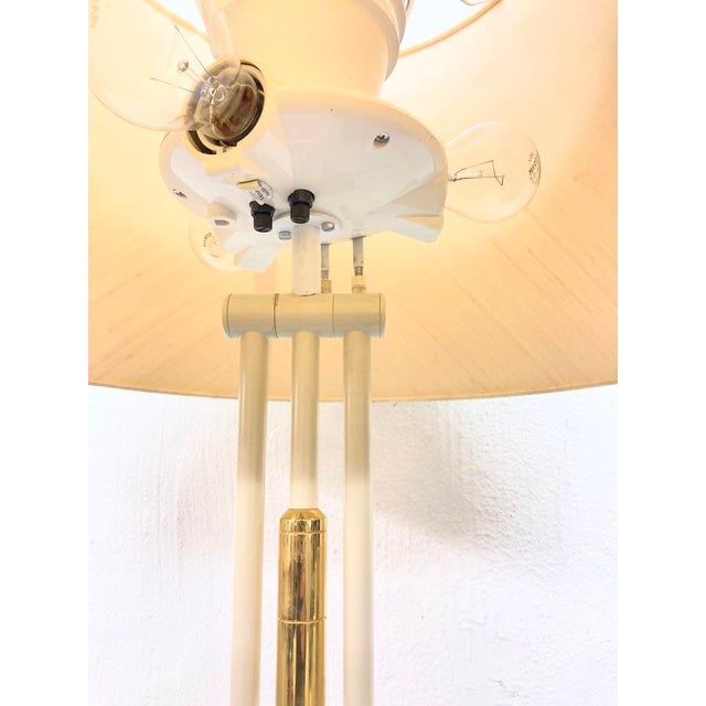One multi-adjustable floor lamp from the 1980s, dimmable via two knobs on the lamp base, four lights, E27 sockets, one...