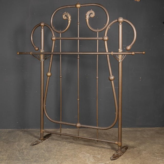 Antique 19th Century pair of huge coat stands from a Victorian hotel. These large brass pieces have rails on both sides...