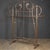 Antique 19th Century pair of huge coat stands from a Victorian hotel. These large brass pieces have rails on both sides...