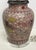 Distinctive crrackle-glaze porcelain lamp with purples, yellows, chartreuse, and pinks. Horse motifs surround the lamp...