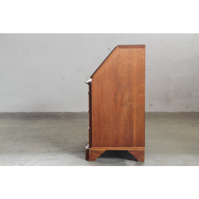 A striking example of early 20th-century historicist design, this substantial secretary bureau captures the architectural...