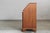 A striking example of early 20th-century historicist design, this substantial secretary bureau captures the architectural...