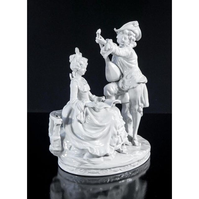 Capodimonte porcelain sculpture group, gallant scene with mandolin player and seated lady. Italy, late 20th century origin...