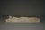 An unusual carved sculpture of a reclining nude.
