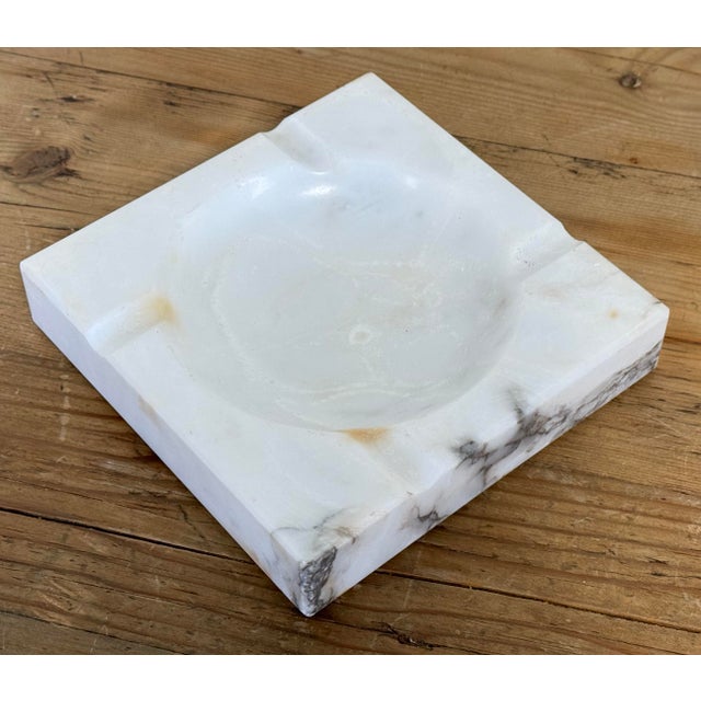 Vintage square alabaster ashtray or trinket dish. Features soft veining. Marked Made in Italy. Age wear. Free of chips or...