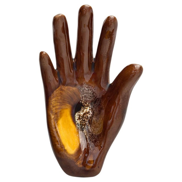 This mid-century modern ceramic dish from Vallauris, France, is a refined example of 1960s French studio pottery, crafted...