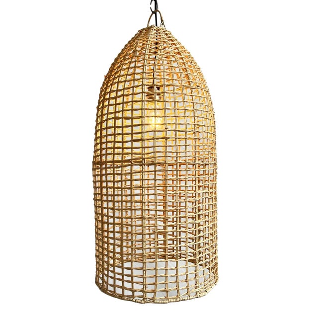 Fresh and airy rattan basket woven bottle shape pendant light. Each may vary slightly in natural coloring and handmade...