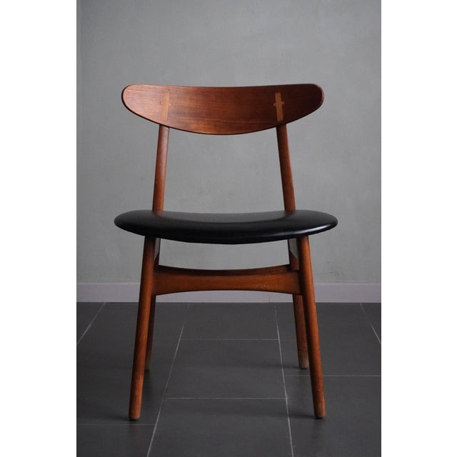 Set of 4 CH 30 chairs by Hans J. Wegner for Carl Hansen & Søn, in teak and walnut, with seats restored to their original...