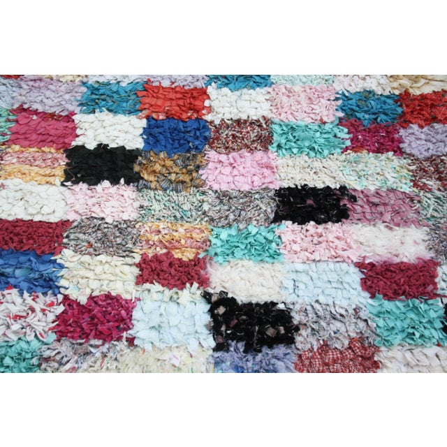 One-of-a-kind vintage hand-knotted Moroccan rug with plush pile consisting of wool and cotton fabrics. Exhibiting an...
