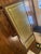 Wood, leather, metal hardware made in England. Mahogany/brown color wood, deep green and gold. Style : english traditional...