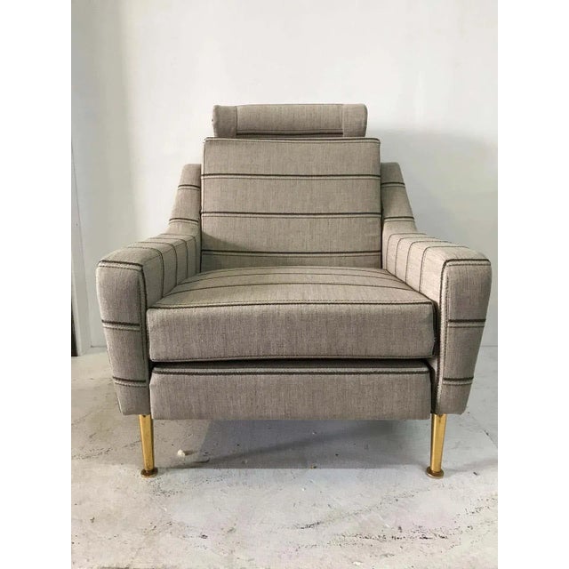 This is a wonderful 1950s Classic Italian designer chair, reupholstered in a natural linen. Original brass feet and...