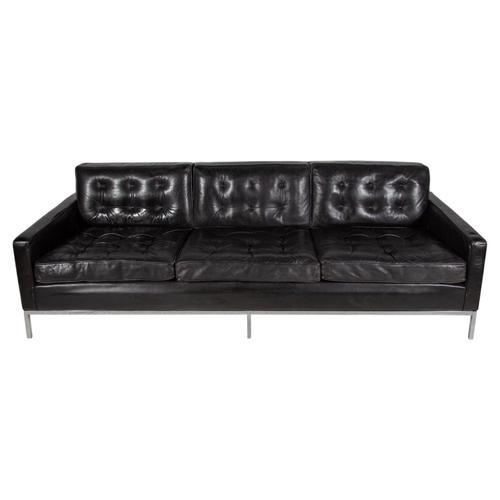 This timeless iconic vintage black leather 3-seat sofa was designed in 1954 by Florence Knoll. The 3-seat sofa featuring...