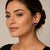14k East-West mounted oval amethyst earrings, 8.54 grams