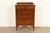 An exceptional French Regency Louis XVI style highboy dresser or chest of drawers In the manner of Berkey and Gay USA,...