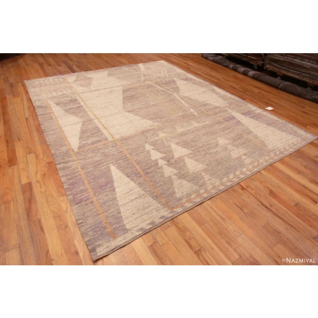 A Decorative and Artistic Light Neutral Warm Color Tribal Geometric Design Modern Room Size Rug, Country Of Origin:...